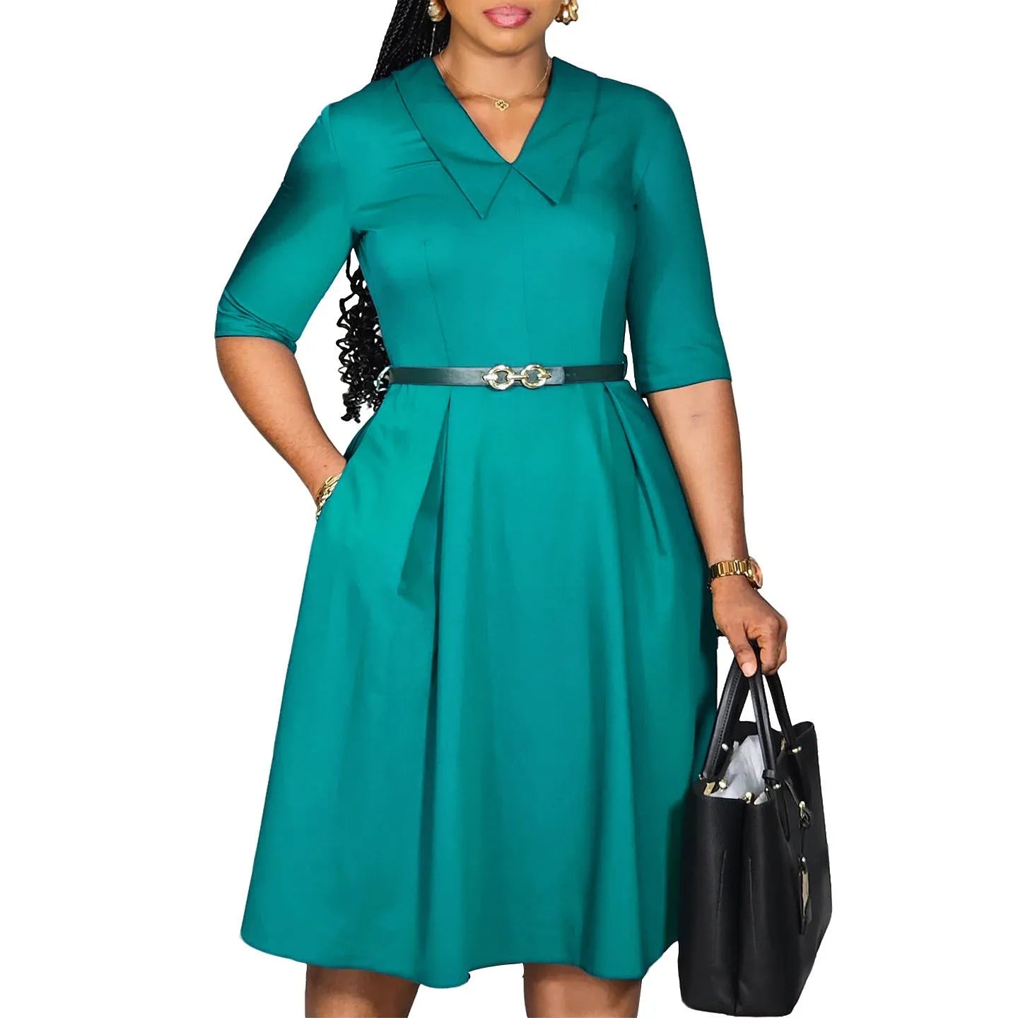 Green high waist African dress with matching belt and half sleeves on mannequin