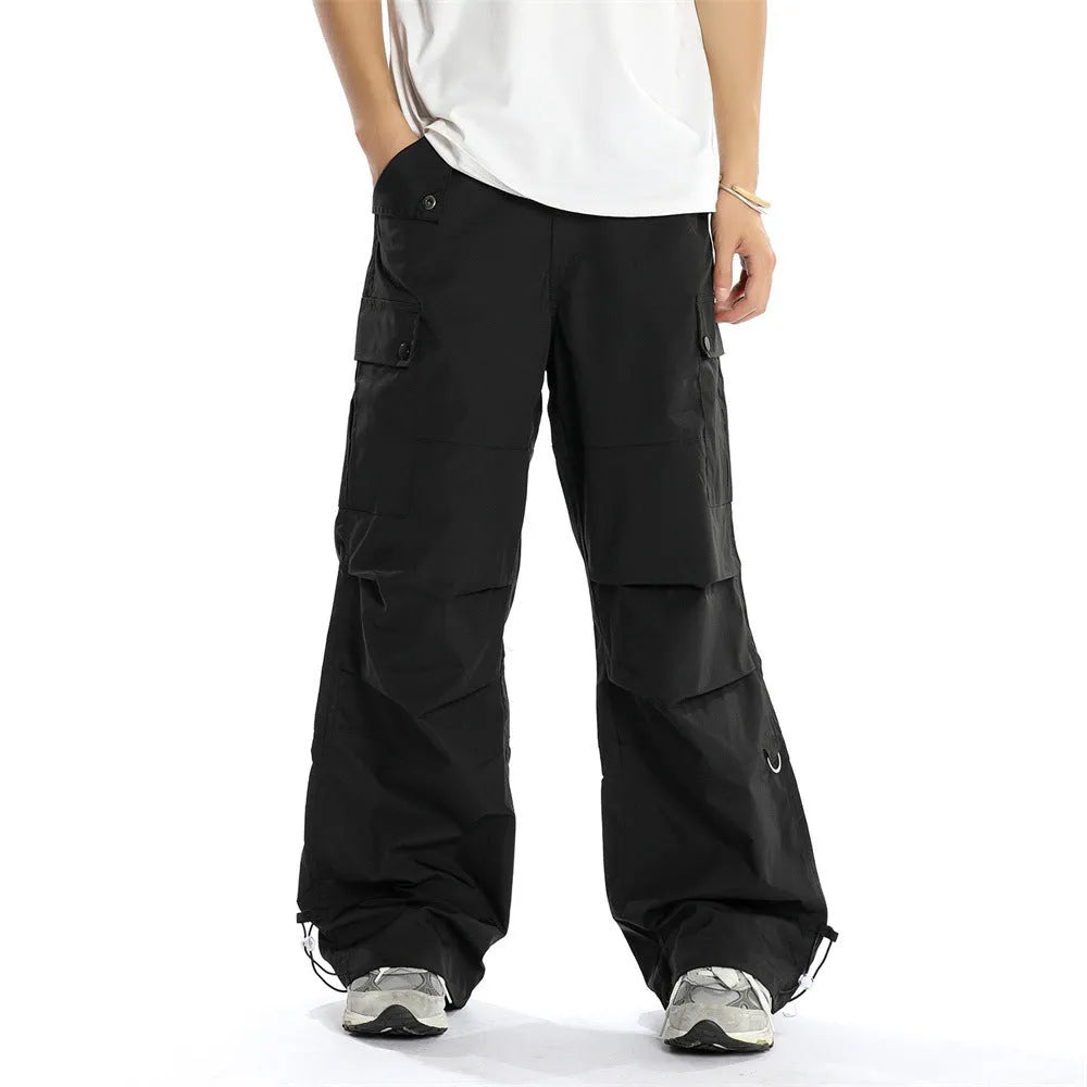 Loose men's cotton trousers in solid colour for street workwear, sizes S to XL, in black and brown