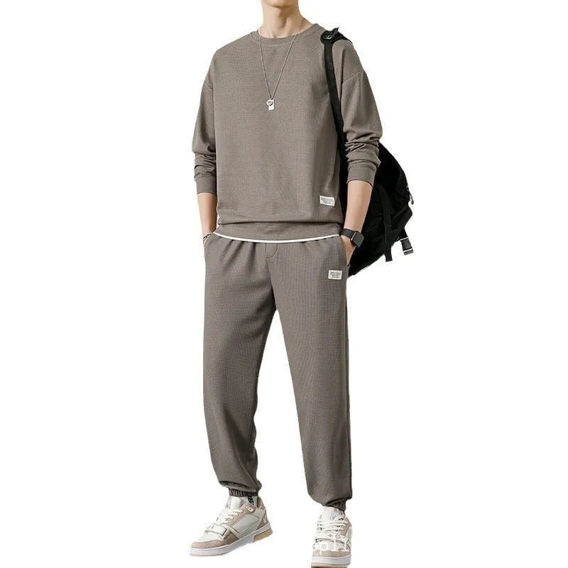 Long-sleeved waffle tracksuit set in nine colours, sizes L to 5XL, chemical fibre blend.