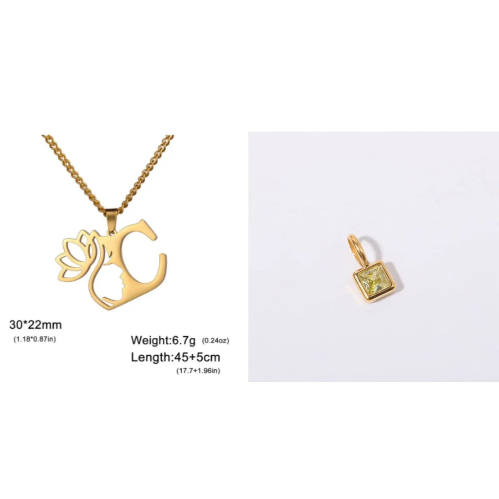 Gold electroplated stainless steel necklace with a cross chain and a letter 'A' pendant on a white background.