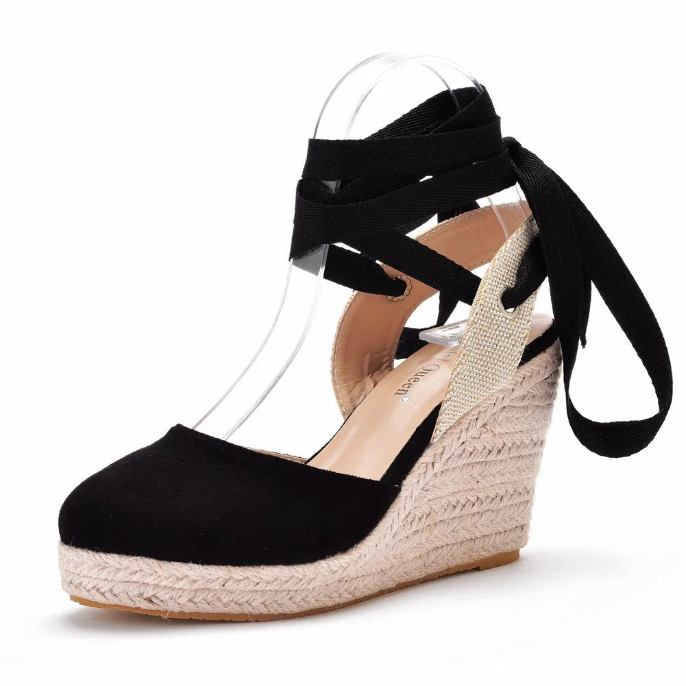 Women's red bohemian wedge sandals with beaded tassel decoration and a buckle strap.