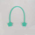 Silicone cable winder organiser with magnet in assorted colours on a table.