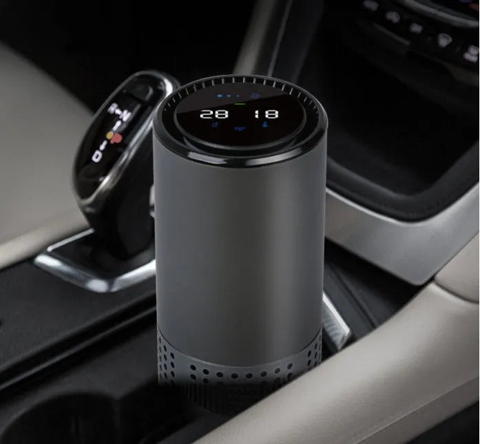 Aluminium alloy car air purifier with display screen and USB cable for vehicle use.