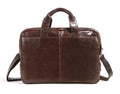 Brown leather men's business briefcase with laptop compartment showing cowhide texture