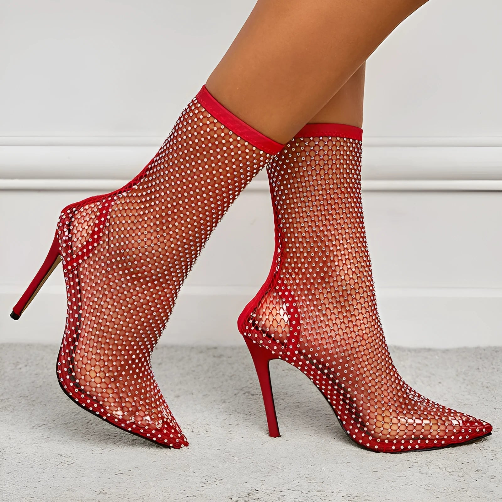 Women's stiletto heel pointed toe hollow mesh boots in black with oversleeve design