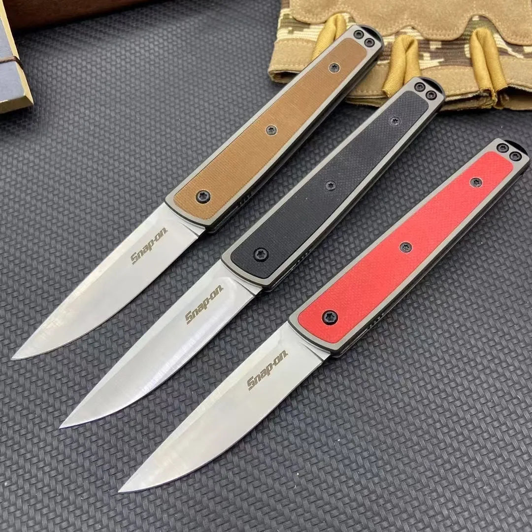 CRKT 7190 folding fruit knife with stainless steel blade in black, red, or coffee colour, showing closed and open positions