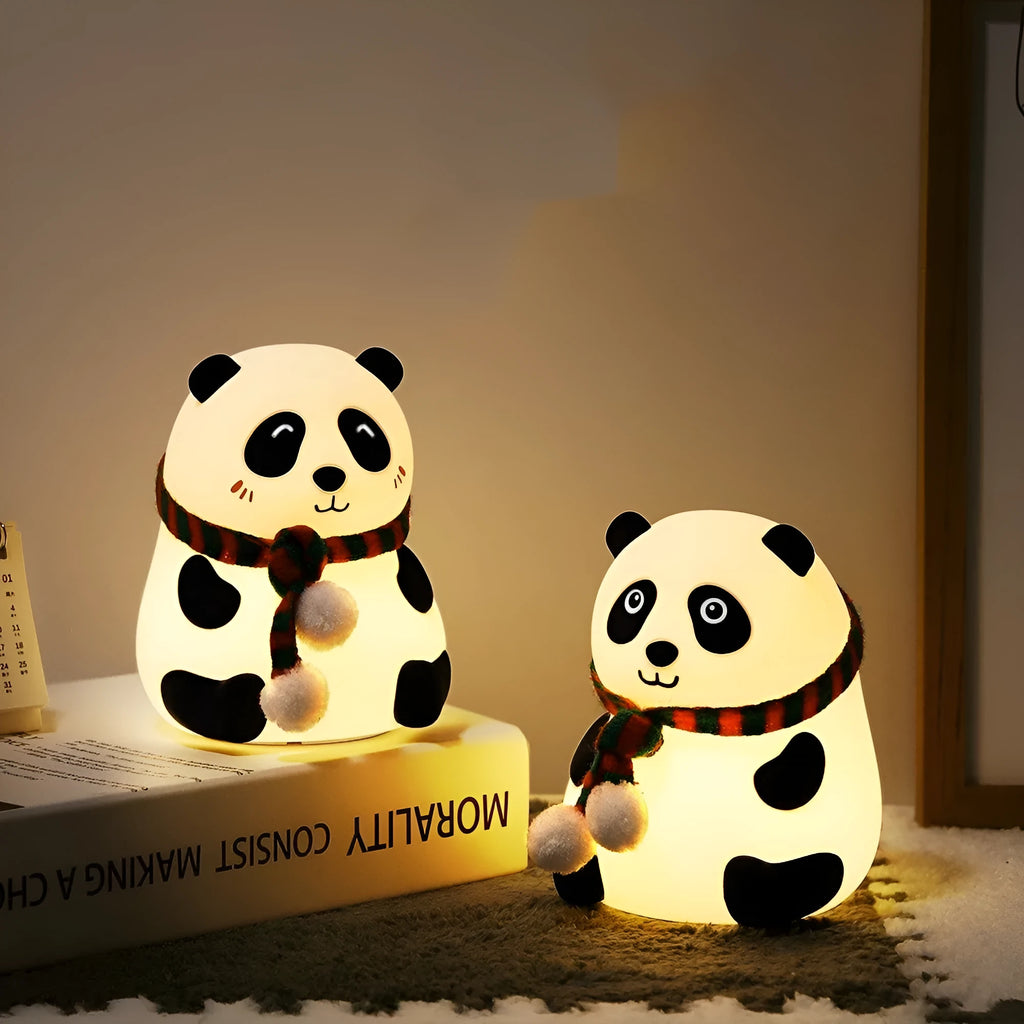 Panda-shaped silicone night light with USB charging port and compact design.