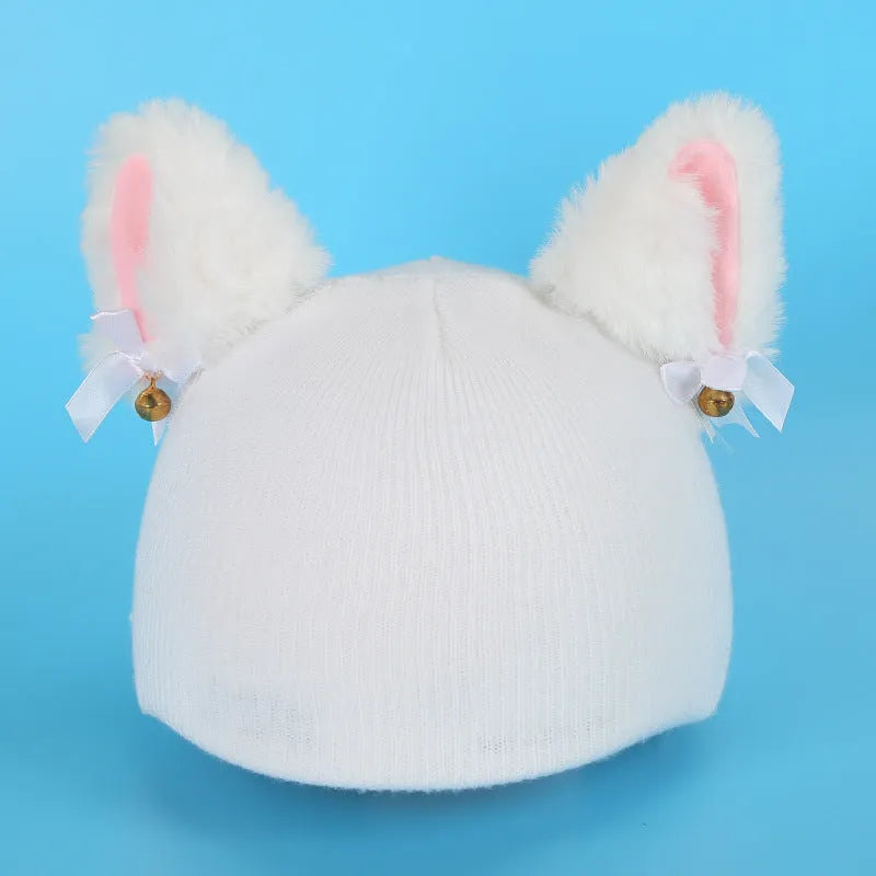 A soft plush cartoon character cover stretched over a medium-sized motorcycle helmet.