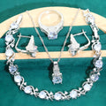 Four-piece bridal jewellery set showing necklace, bracelet, earrings and ring with alloy pendant and water wave chain