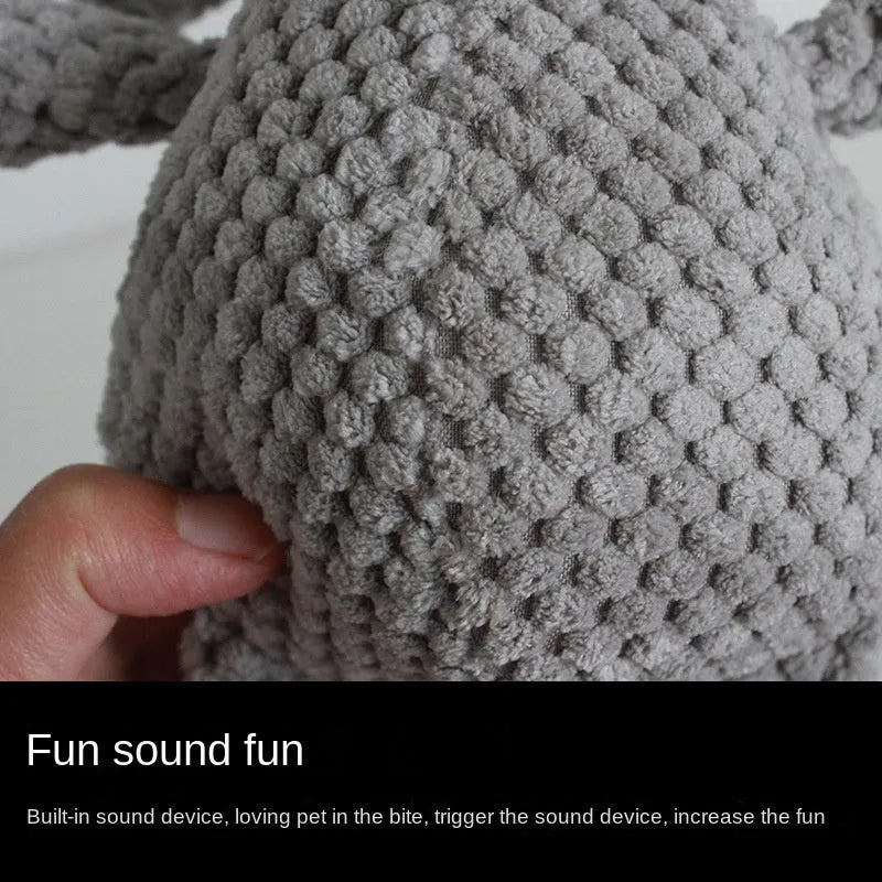 Plush squeaky dog toy in animal shape for chewing and teeth cleaning