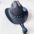 Brown British cowboy hat for a cat on a white background with a black ribbon trim.