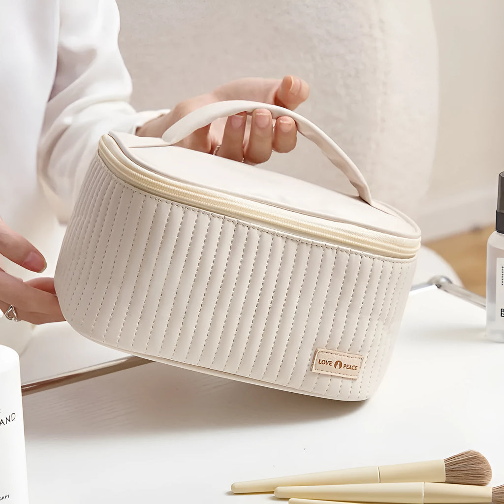 Open-top round women's makeup bag in solid colour PU leather.