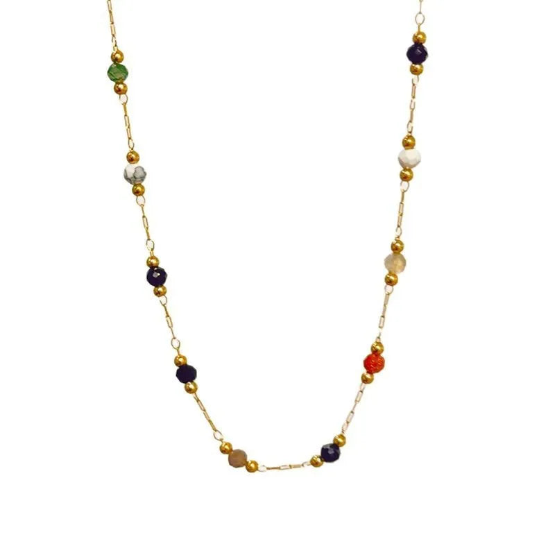 Gold titanium steel women's necklace with natural stone pendant on O-ring chain.