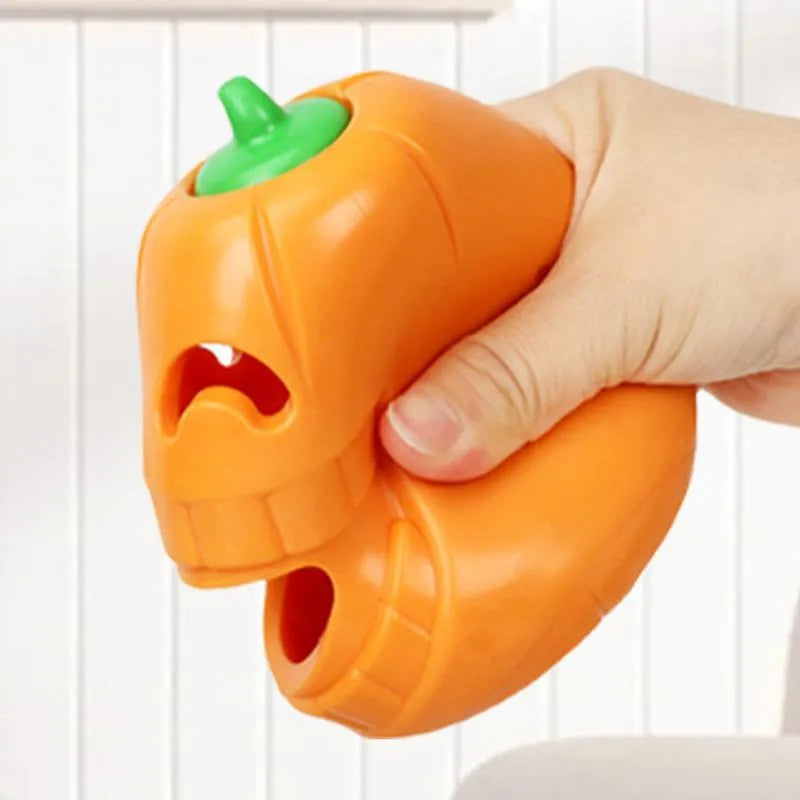 Yellow pumpkin-shaped TPR dog chew toy measuring 8.6x11.5cm for aggressive chewers