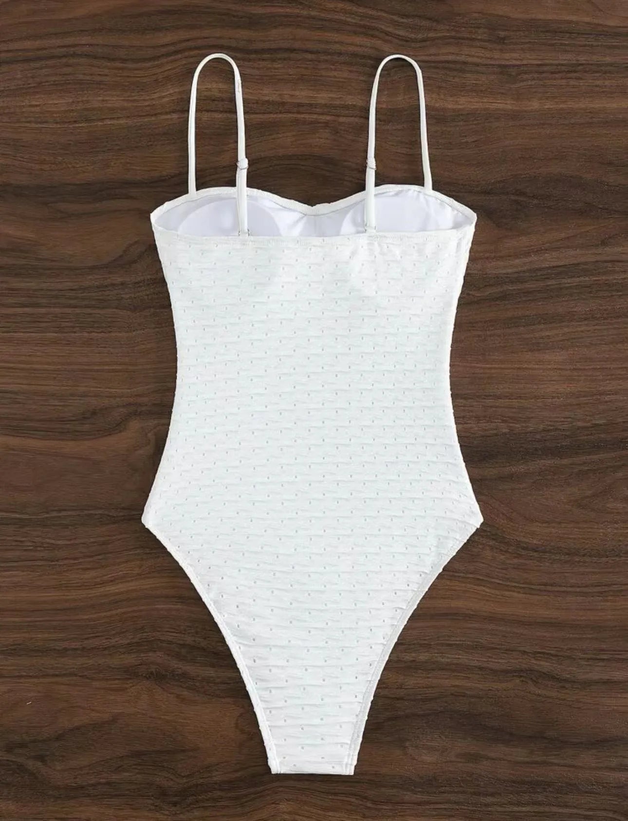 White women's one-piece swimsuit with sling design and briefs-style European pattern