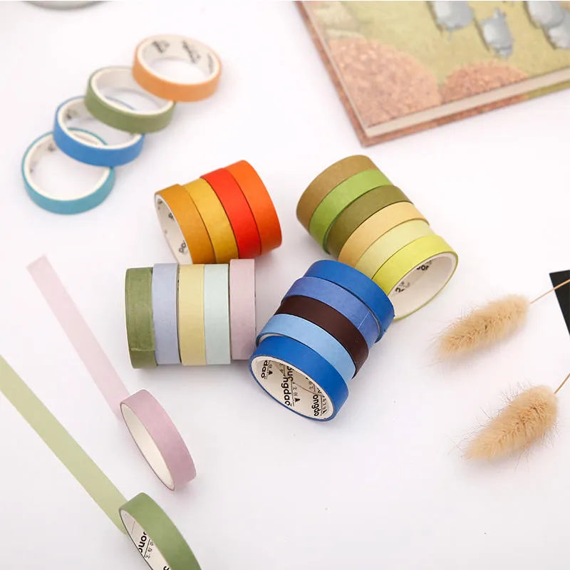 Six rolls of solid-colour 9mm ledger tape with labels showing solar term names like Start of Spring and Autumn Equinox