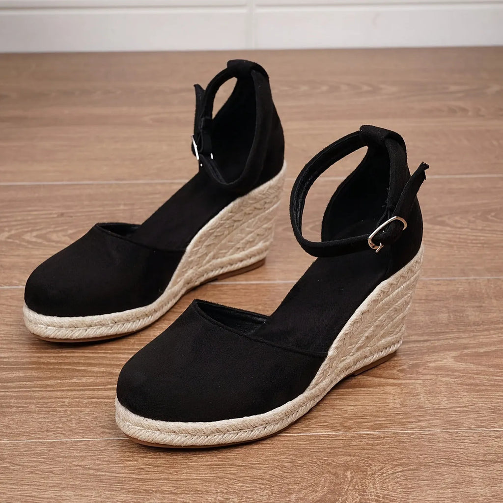 Women's apricot suede and canvas wedge sandals with a buckle strap.