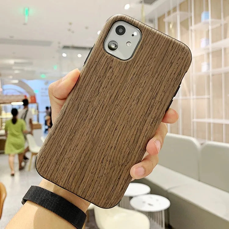 Wooden iPhone back cover case in rosewood finish showing natural wood grain