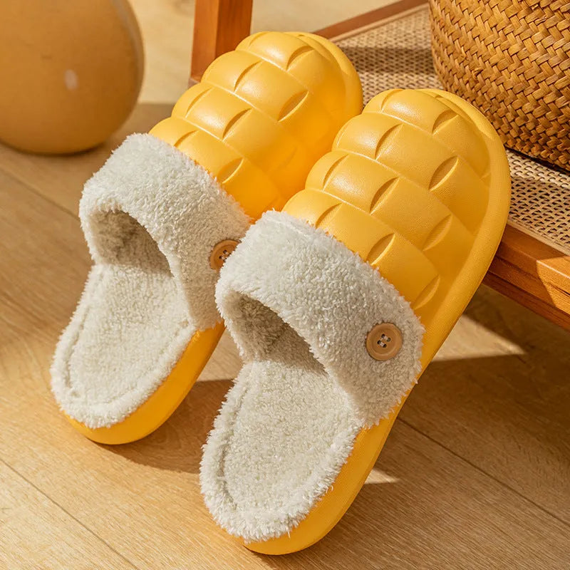 Women's pink detachable plush EVA winter house slippers with non-slip sole shown from the side.