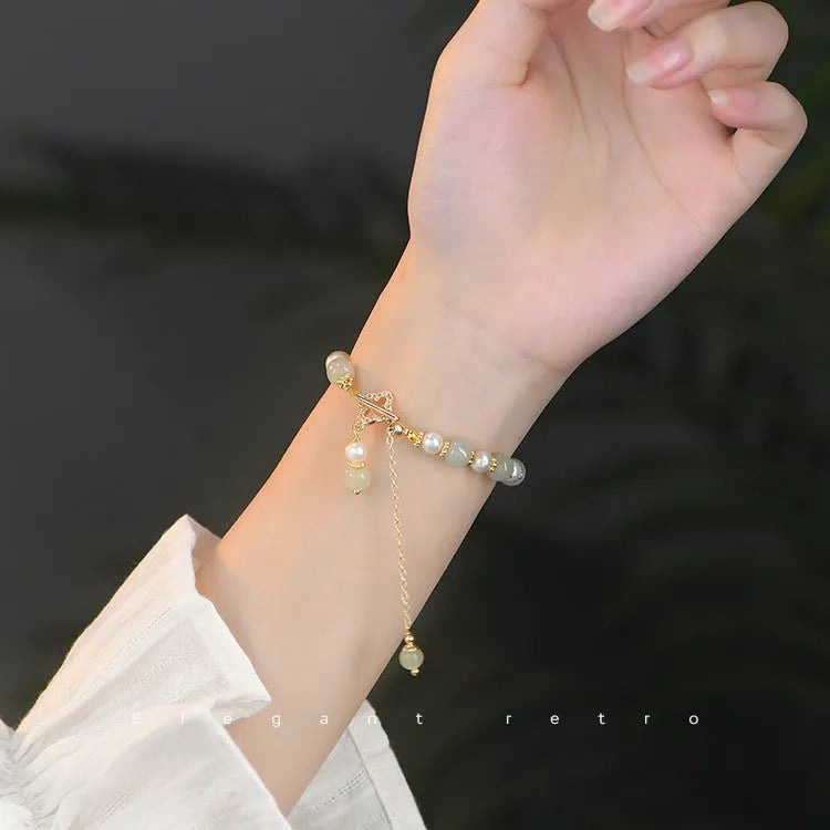 Hetian Jade women's bracelet with natural jade pearl pendant and gold electroplated alloy metal