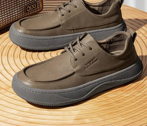 Brown retro casual leather shoes with big toe design and stitching, shown on a white background.