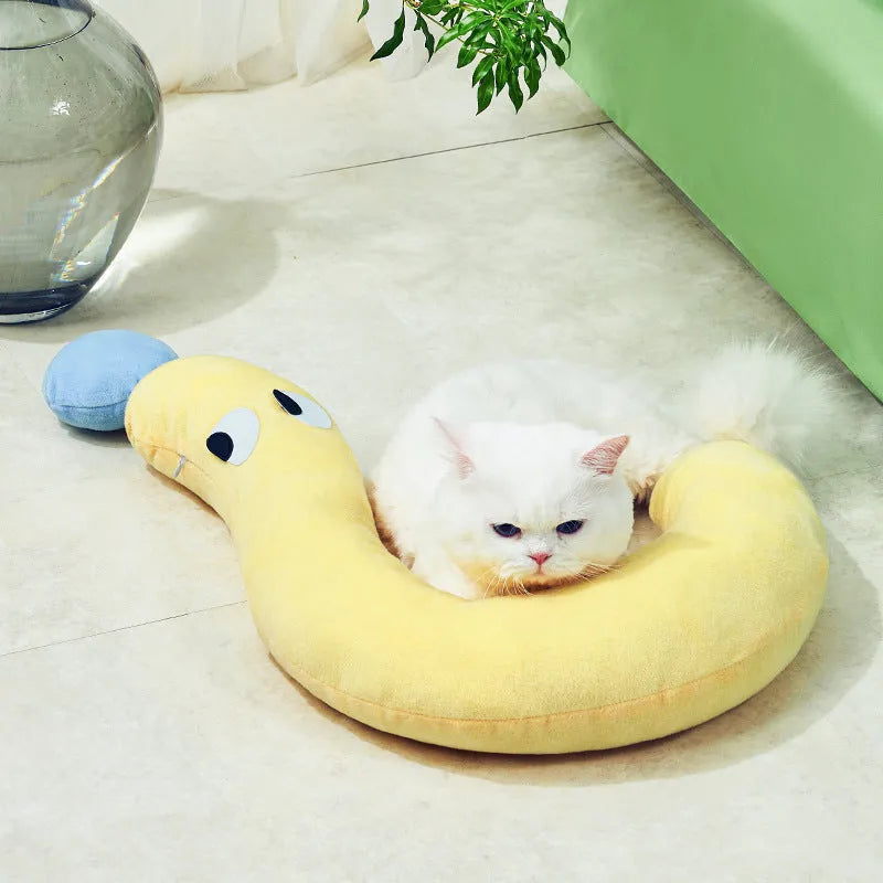 Blue rectangular pet pillow for cats and dogs on a floor, dimensions 62cm by 39cm.