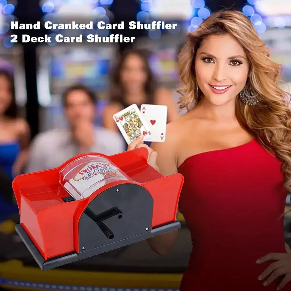 Black manual card shuffling machine with hand crank on wooden table