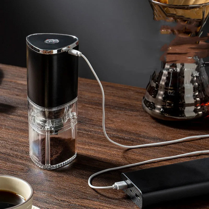 White portable electric coffee grinder with ceramic burr and USB charging cable