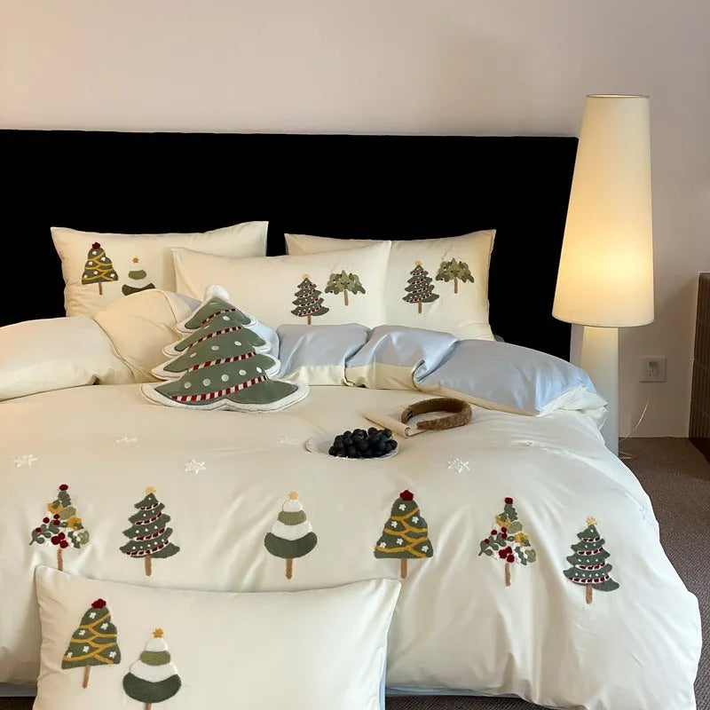 Cream Blue pure cotton duvet cover with raised towel embroidery of a Christmas tree and flowers, part of a four-piece bedding set.