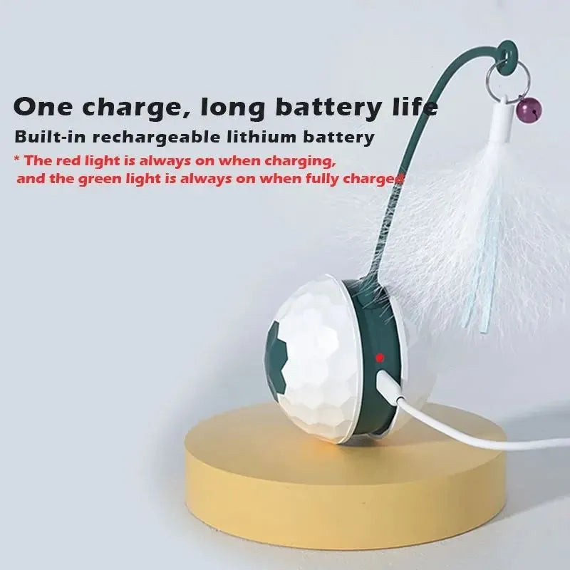 Red automatic cat toy with feather attachment showing tumbler design and USB charging port