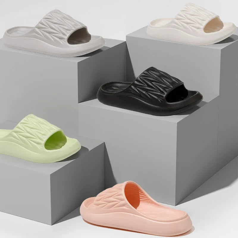 Leaf texture pattern EVA slippers for men and women in various colours on a white background.