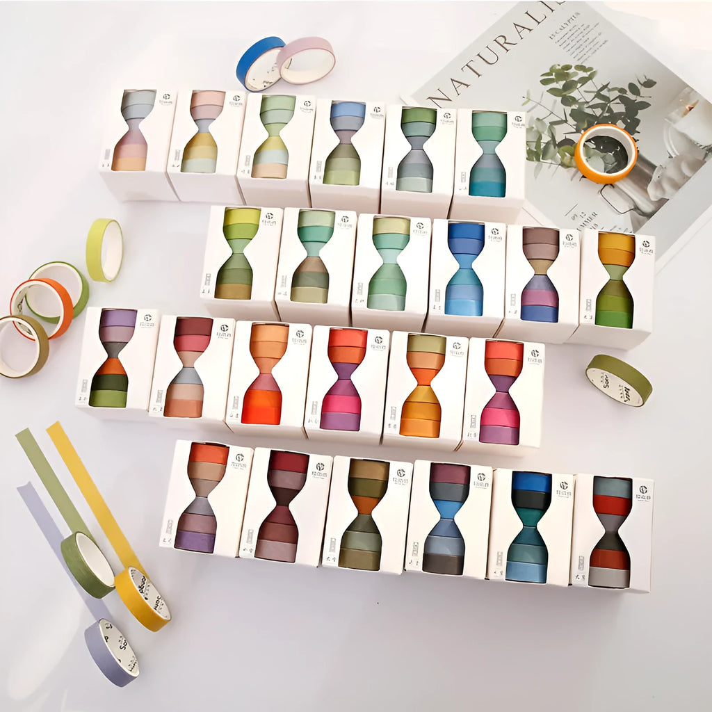 Six rolls of solid-colour 9mm ledger tape with labels showing solar term names like Start of Spring and Autumn Equinox