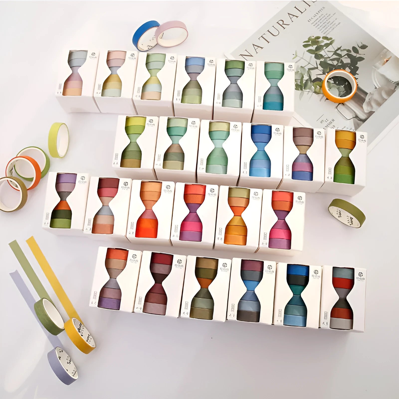 Six rolls of solid-colour 9mm ledger tape with labels showing solar term names like Start of Spring and Autumn Equinox