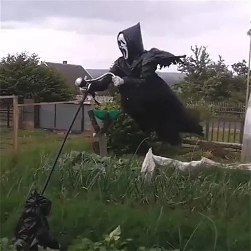Plastic skeleton scarecrow decoration with skull design, measuring 70cm high.