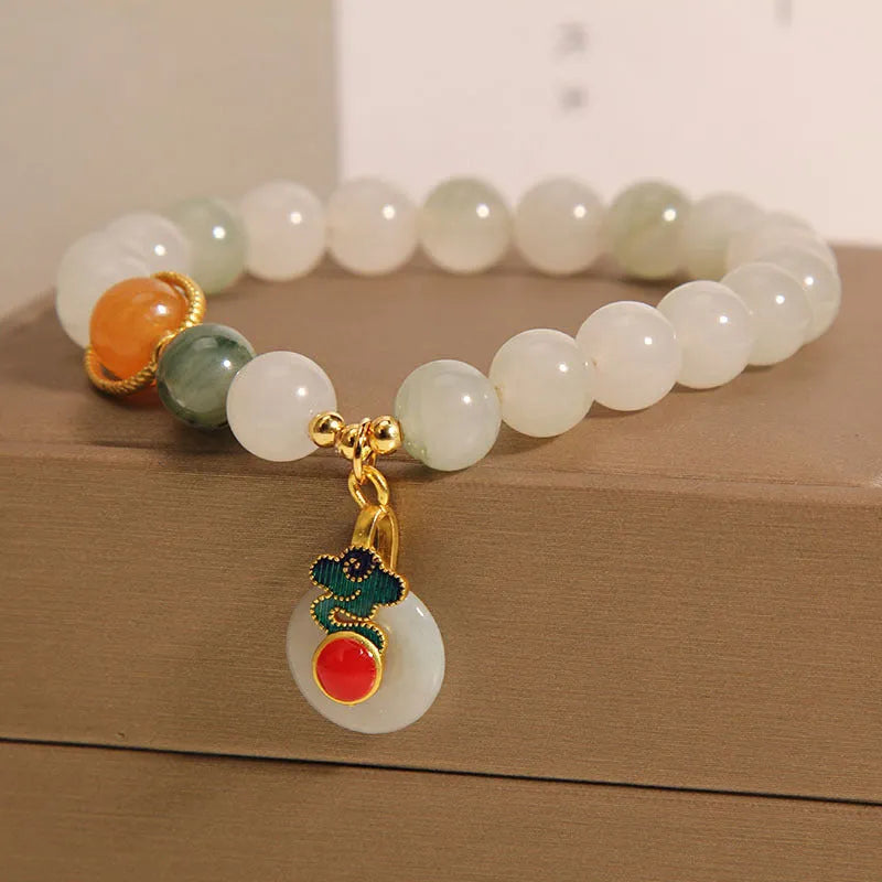 Women's jade crystal bracelet with ice jade colour, xiangyun patterns and pearl decorative elements