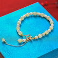 Hetian Jade women's bracelet with natural jade pearl pendant and gold electroplated alloy metal