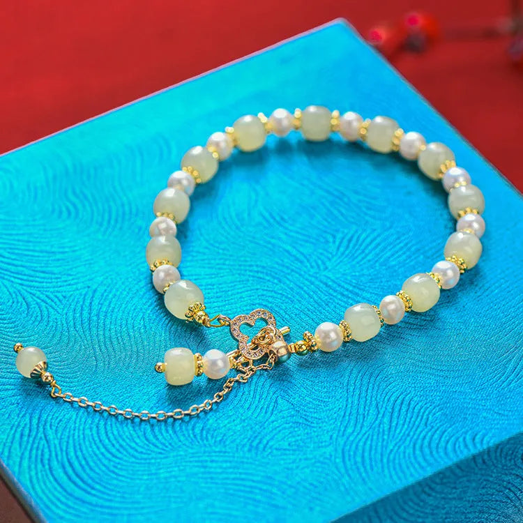 Hetian Jade women's bracelet with natural jade pearl pendant and gold electroplated alloy metal