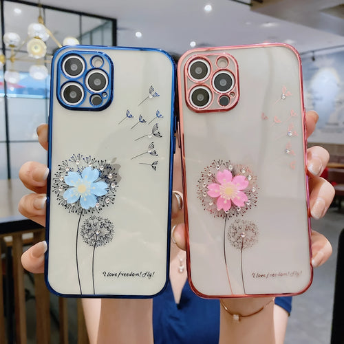 Green iPhone case with 3D white floral design and a silver rotating kickstand extended at the back.