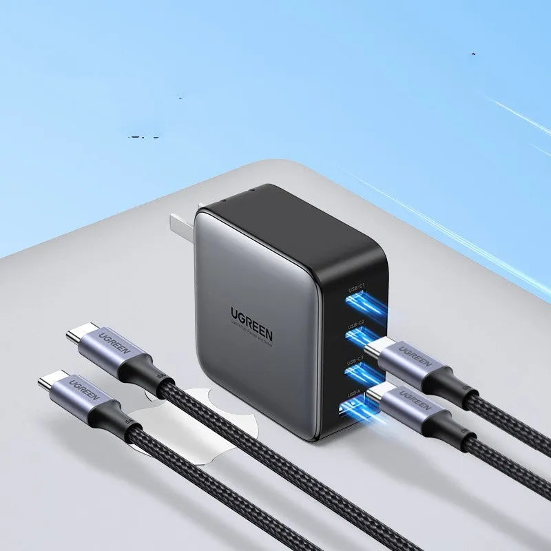 Compact 100W gallium nitride fast charger with Type-C port and included cable on a white background.