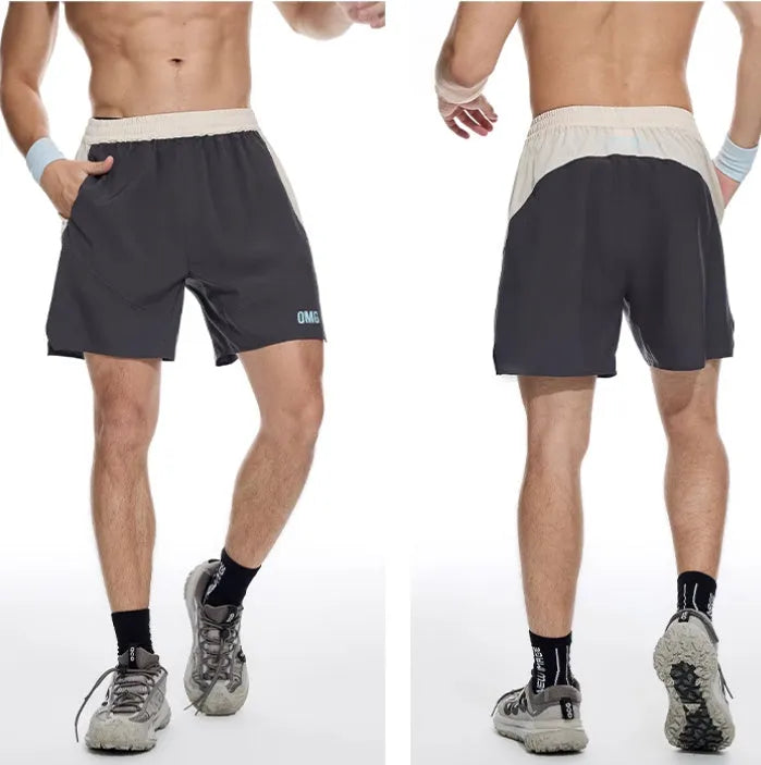 Men's loose fit workout shorts in dark rock ash colour with elastic waist and lace-up fly