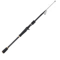 Telescopic carbon fishing rod with matte coating and reel seat on a lakeside bank