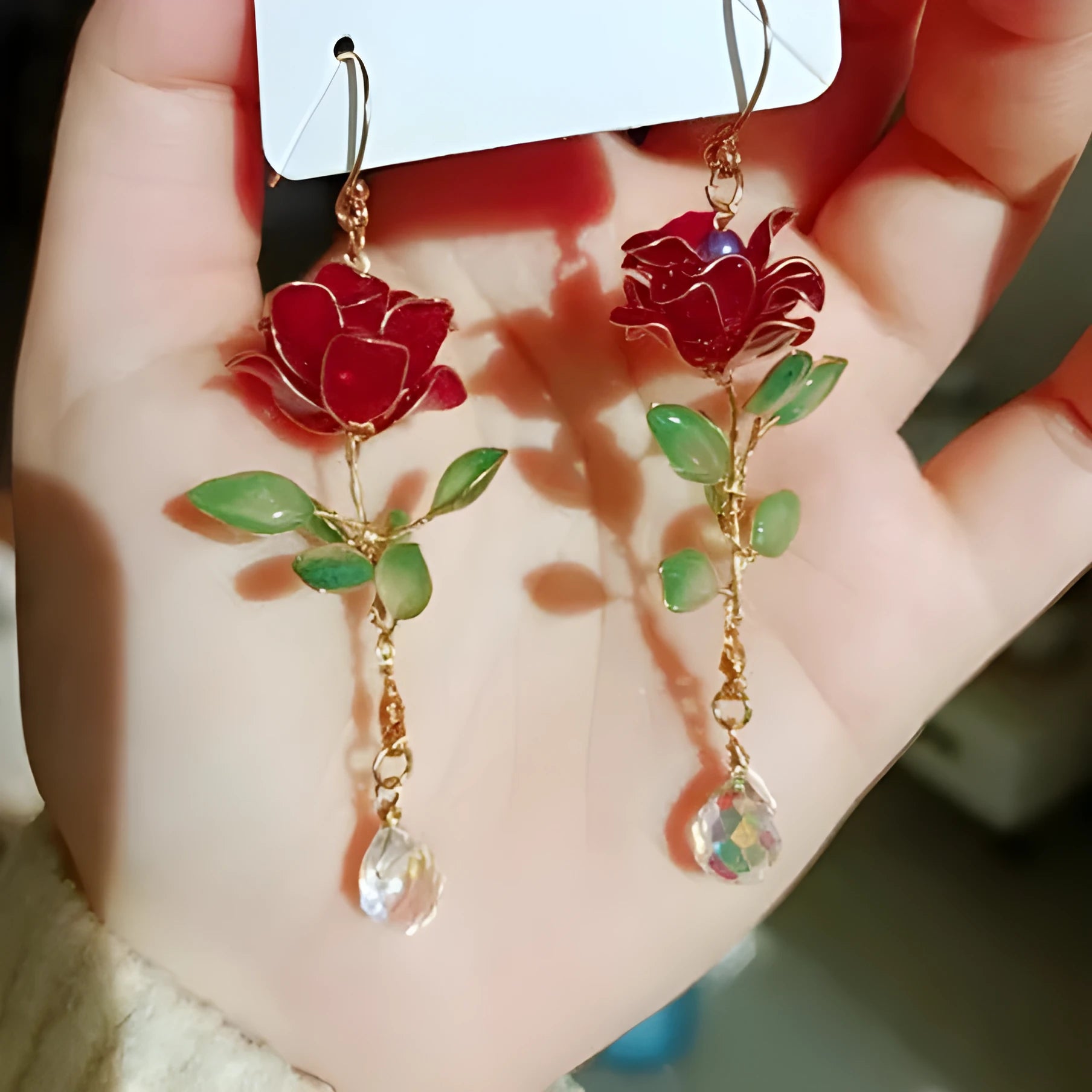 Red flower-shaped liquid ornament earrings with tea fragrance for women