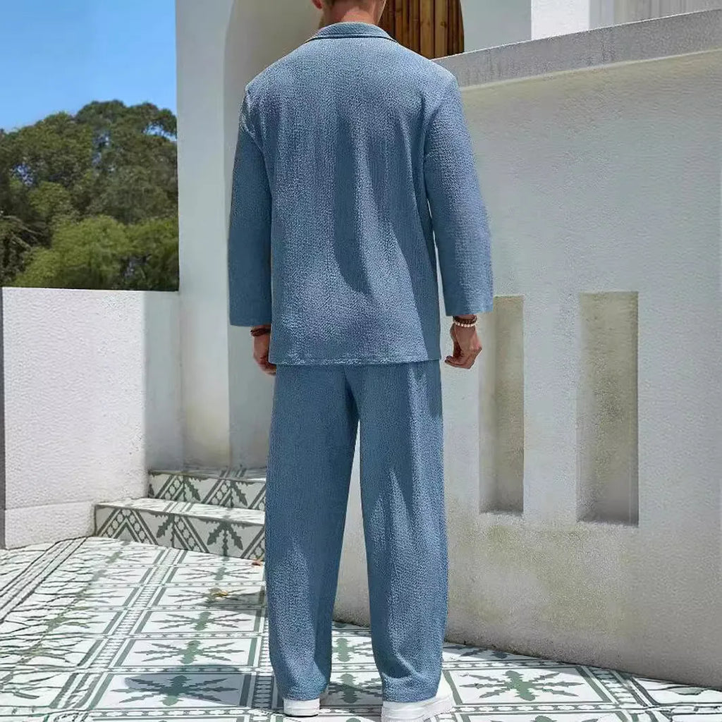 Men's casual shirt and trousers commuter suit set in lake blue, displayed on a hanger.