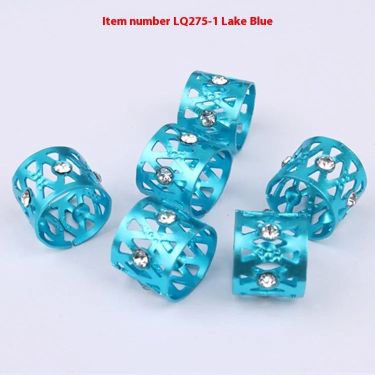 Aluminium hair ring with crown and heart decoration in seven colour options.