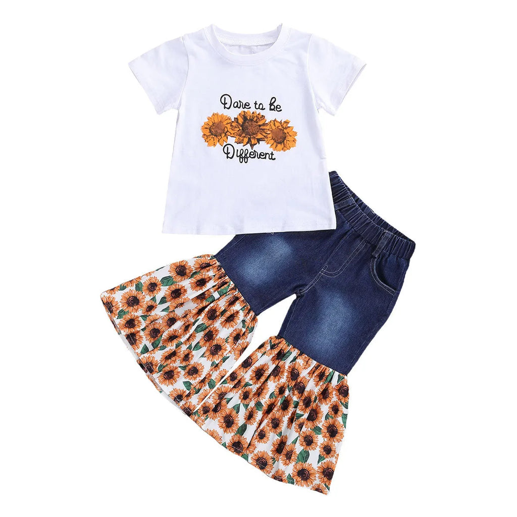White kids two-piece cotton outfit with short sleeve top and trousers featuring denim torch and sunflower print