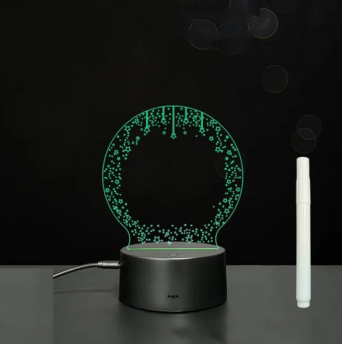 3D acrylic LED message board with touch control, black ABS base, USB cable, and stylus pen on desk