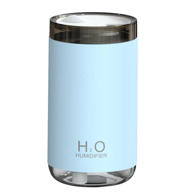 White jellyfish humidifier with USB cable, warm night light, and water mist output