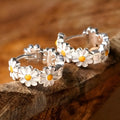 White electroplated daisy flower ring earrings with platinum gem detailing for fashion jewellery wear