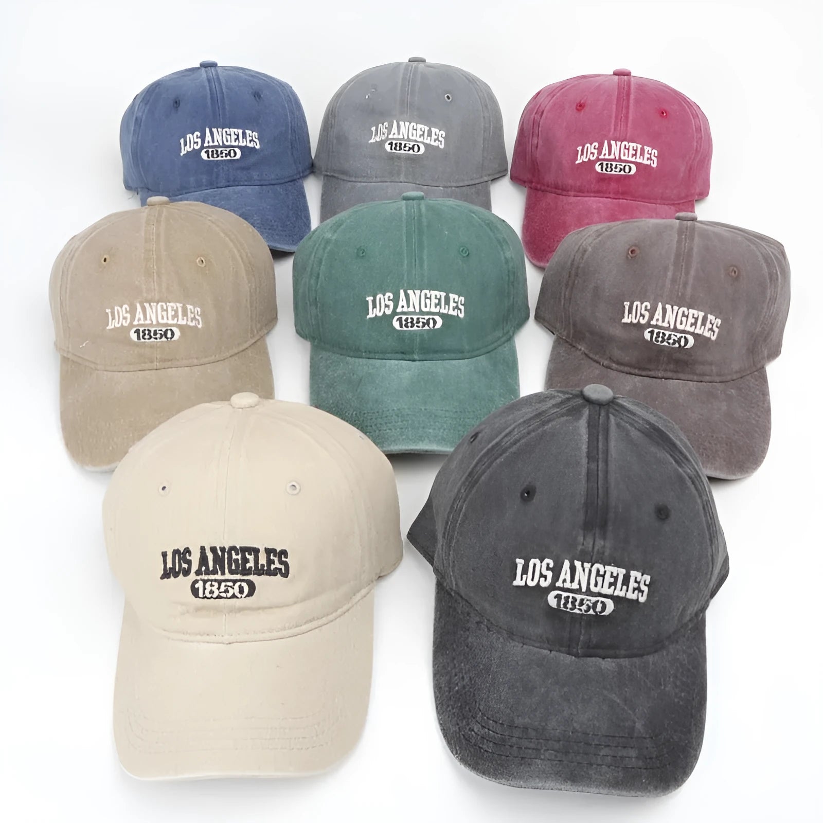Retro beige personalised washed cotton peaked cap with adjustable strap and embroidered letters on the front.