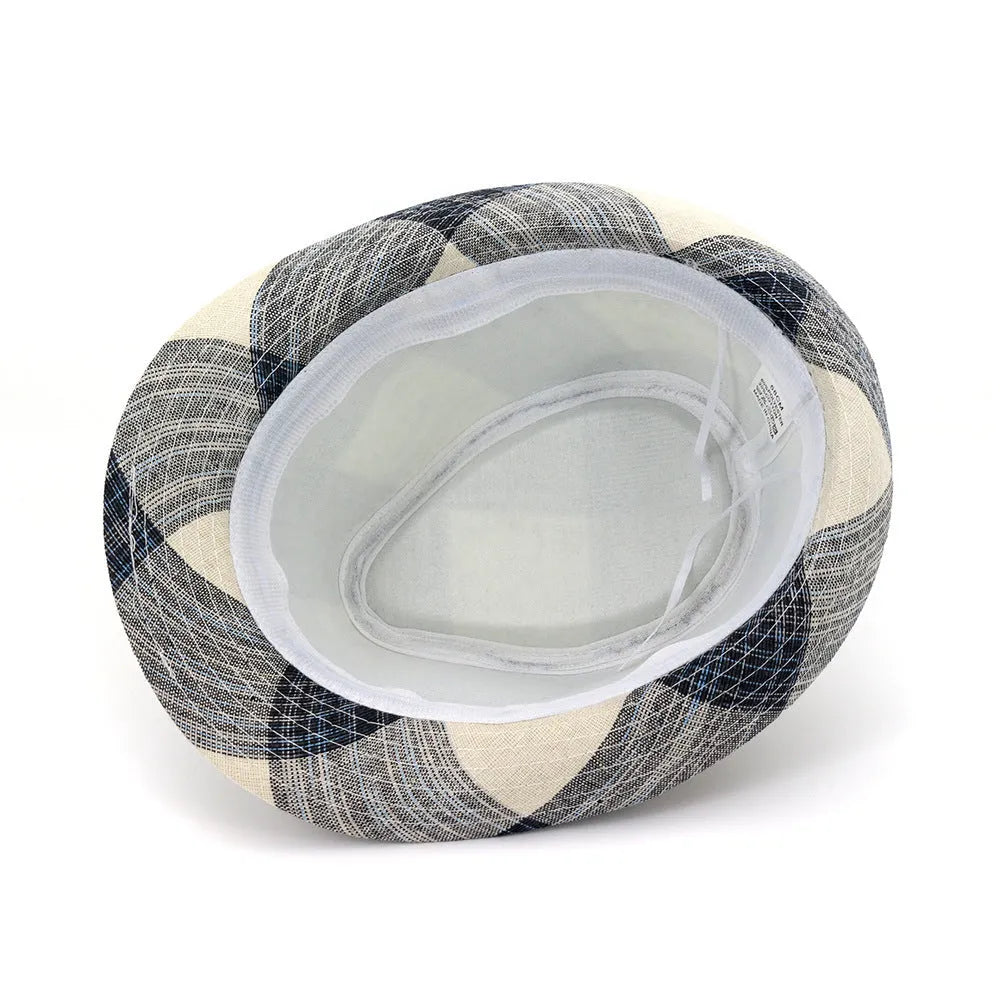 Blue casual sun hat with a bell-shaped crown and a medium-width brim on a wooden background.
